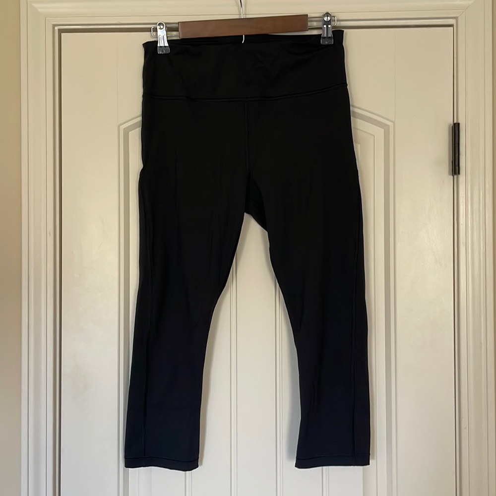 Black Athleta Ultimate Stash Pocket Capri in size medium.
